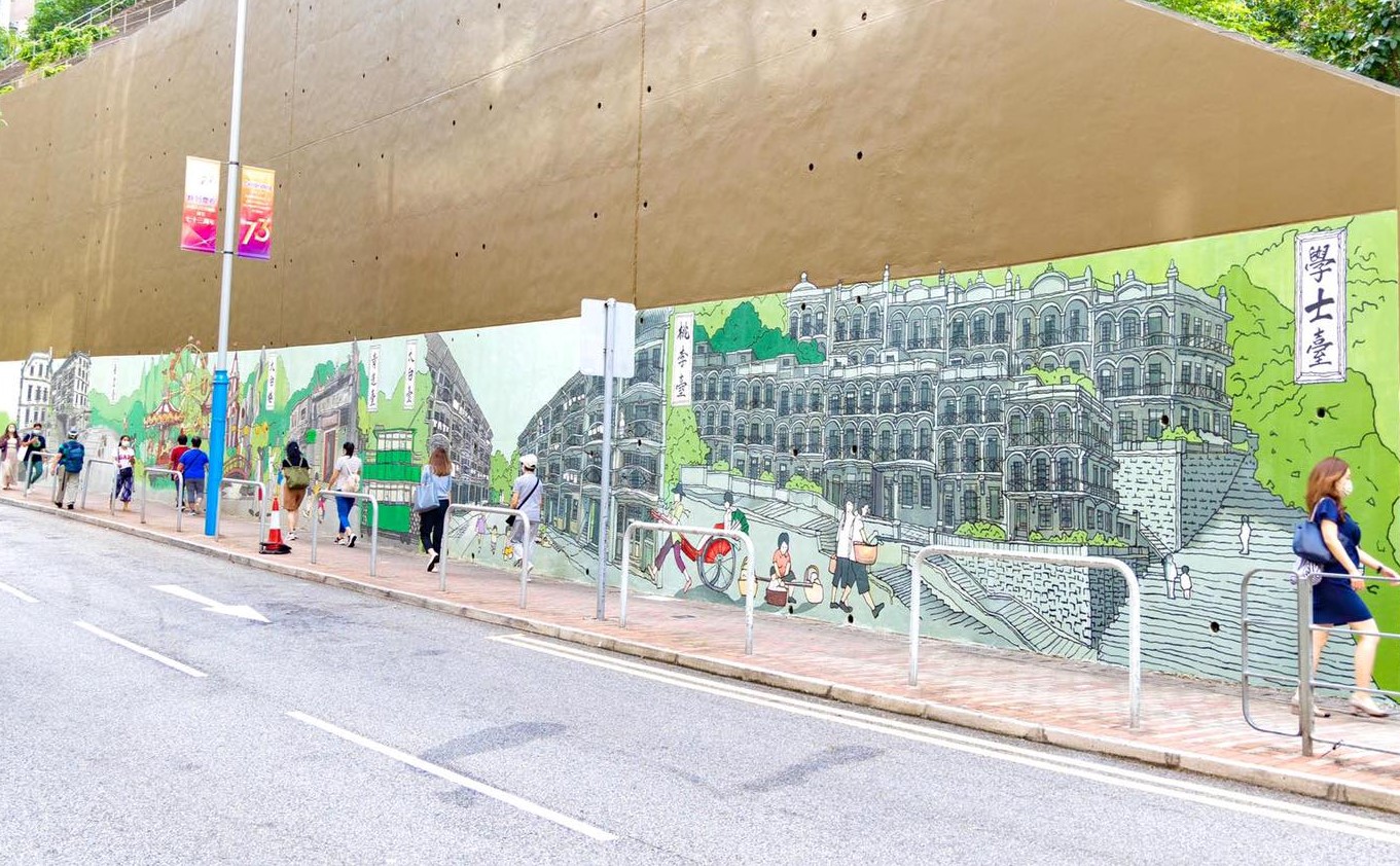 新壁畫位於堅尼地城港鐵站、石山街附近，仔細勾畫出「西環七臺」的建築群，令人回想起西環七臺的歷史。（圖片來源：民政事務總署facebook）